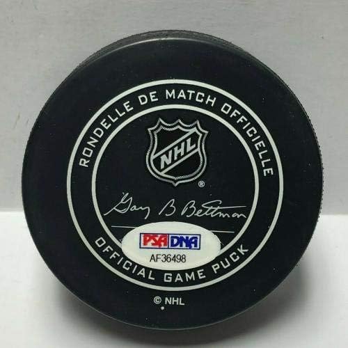 Травис Дермотт подписа хокей шайба Торонто Мейпъл Лийфс PSA AF36498 - за Миене на НХЛ с автограф